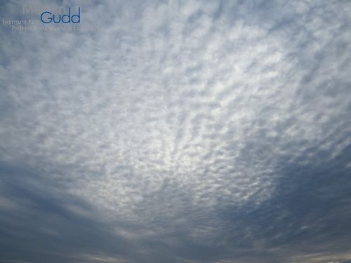 Altocumulus stratiformis opacus mamma